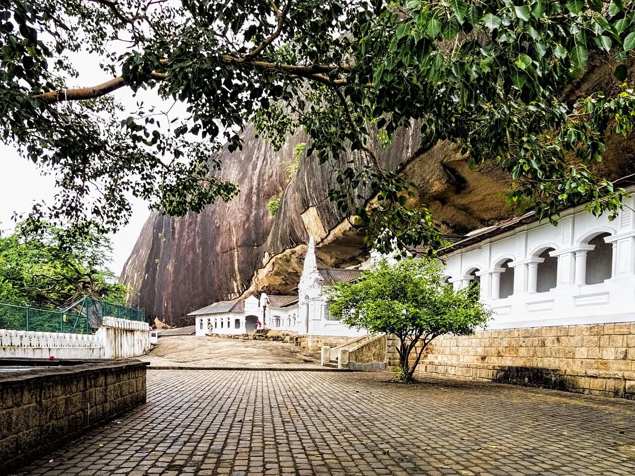 Dambulla - The Royal Rock Temple complex began in the 1st century BCE when King Valagamba was driven out of the capital of Anuradhapura and took refuge in the ca